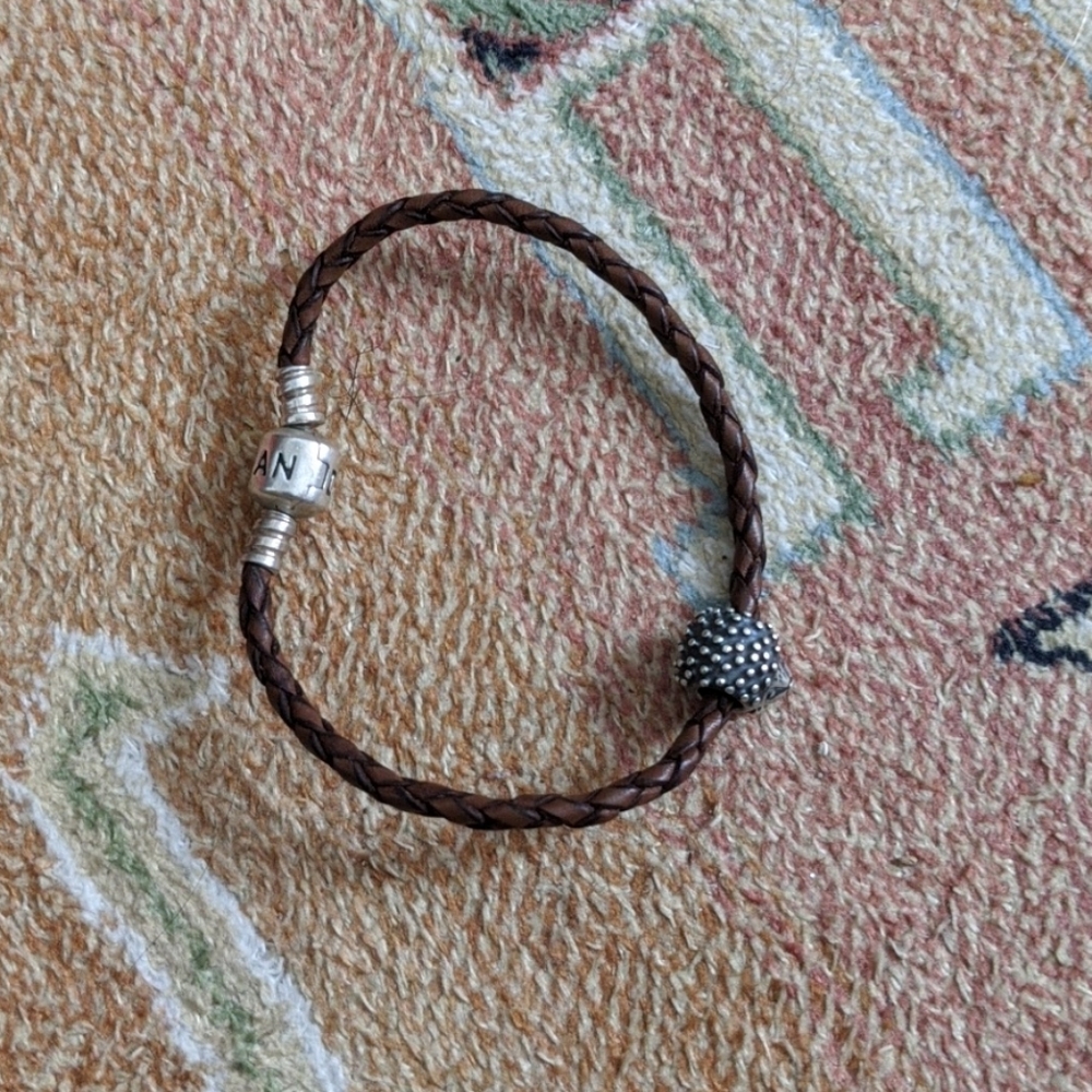 Pandora leather cord bracelet with hedgehog charm